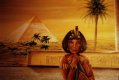Eine Frau vor einer Pyramide im alten Aegypten
Das Bild zeigt eine Pyramide und eine Frau in historischen aegyptischen Kleidern.  Historisch genau dargestellt, ein Busen ist nackt.